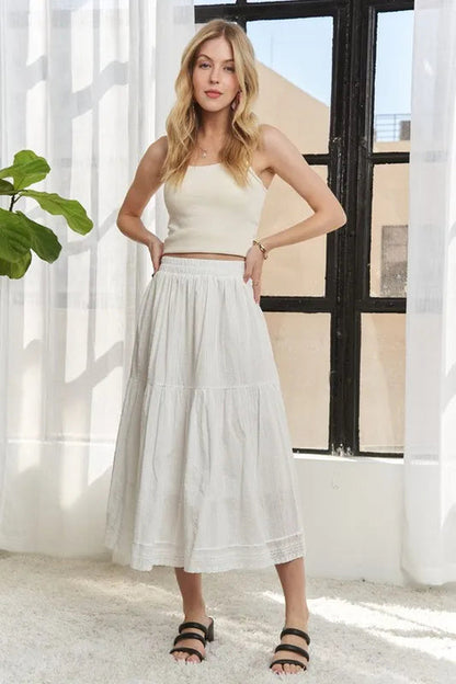 Jade Icarus ADORA elastic waistband tiered midi skirt, designed with a flowing, layered fabric for a stylish look.