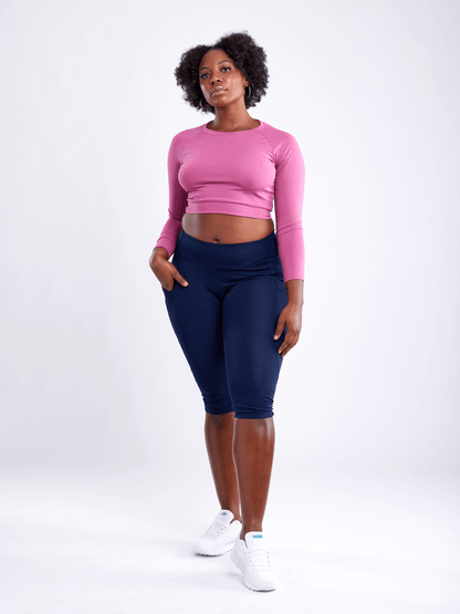 Black Lavender JupiterGear long-sleeve crop top, activewear with fitted design and crew neckline, shown in black fabric.