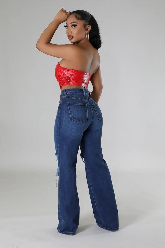 Dark denim Jade Icarus wide leg jeans, showing the relaxed fit and stylish design in a full-length image.