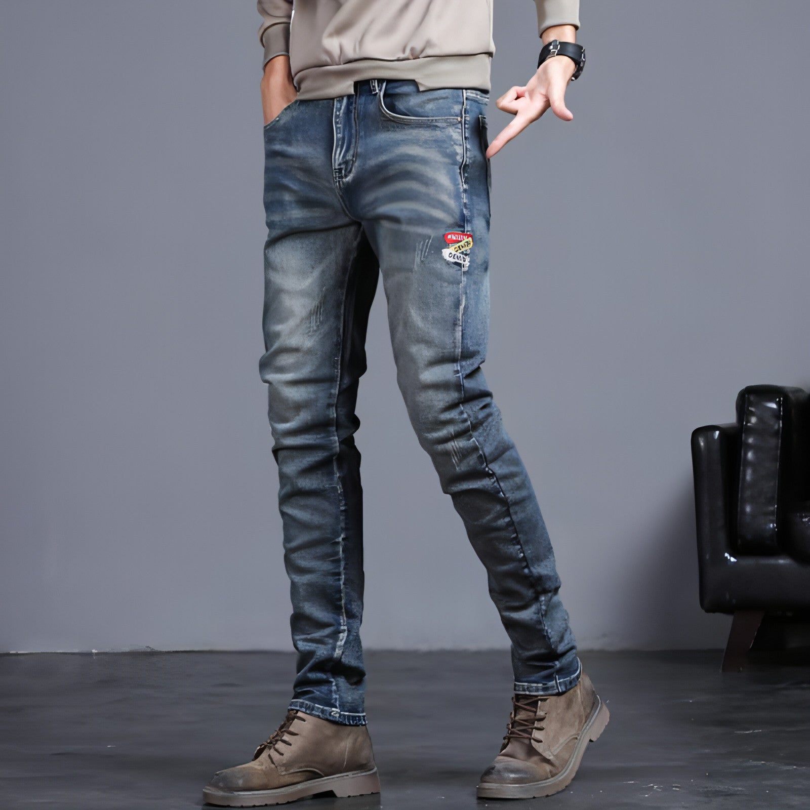 Youth retro embroidered denim pants for men by Carmine Juneberry, showcasing vintage-style jeans with colorful embroidery details.