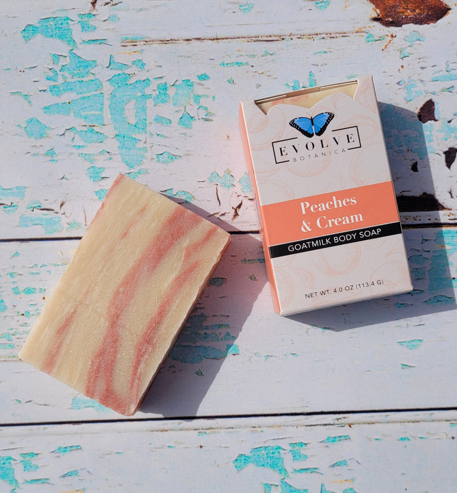 Bar of Start2Finish Peaches and Cream goat milk soap with a smooth, creamy texture and peach scent, shown on a white background.