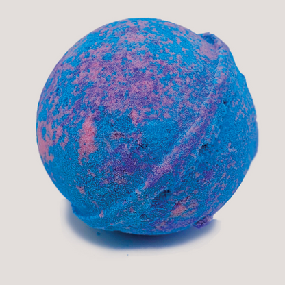 Start2Finish Birthday Cake bath bomb with colorful swirls and floral accents for a relaxing bath experience.