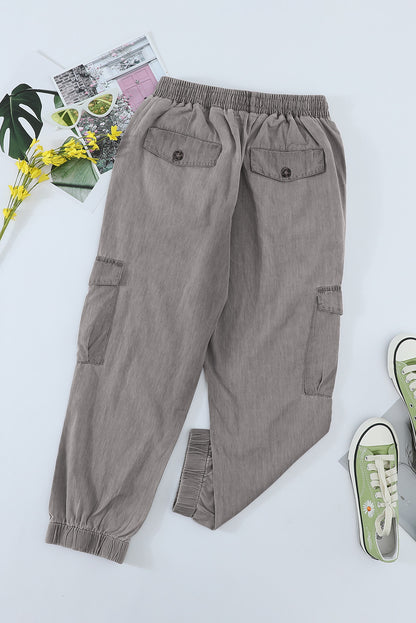 Gray drawstring cargo pocketed joggers for women by Lavender Pallas, featuring comfortable fit and functional pockets.