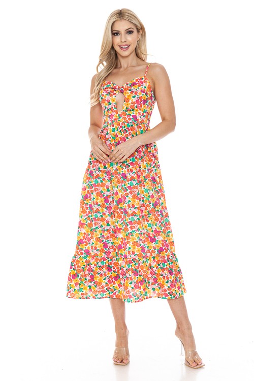 Women’s floral maxi dress by Jade Icarus, flowing fabric with colorful flower pattern, sleeveless design perfect for summer.
