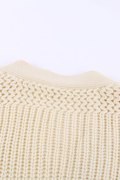 Beige wrap V-neck sweater with side tie, stylish bath and beauty clothing by Harlequin Daisy, displayed on a neutral background.