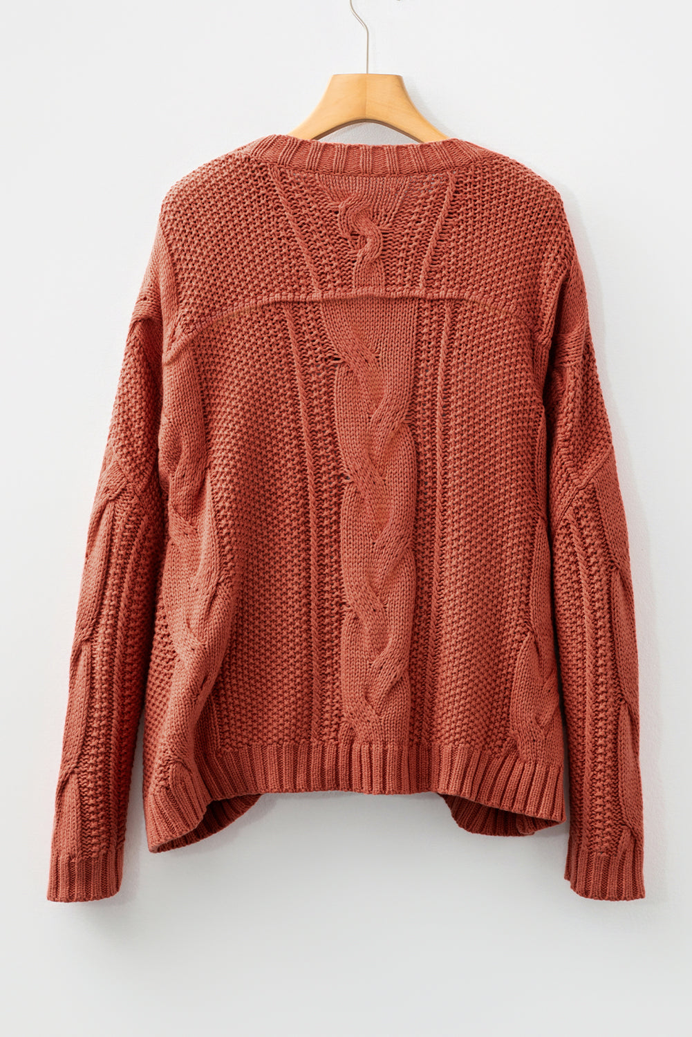 Byzantium Bay textured chunky knit long sleeve sweater with a cozy, thick design and ribbed cuffs, perfect for warm winter wear.