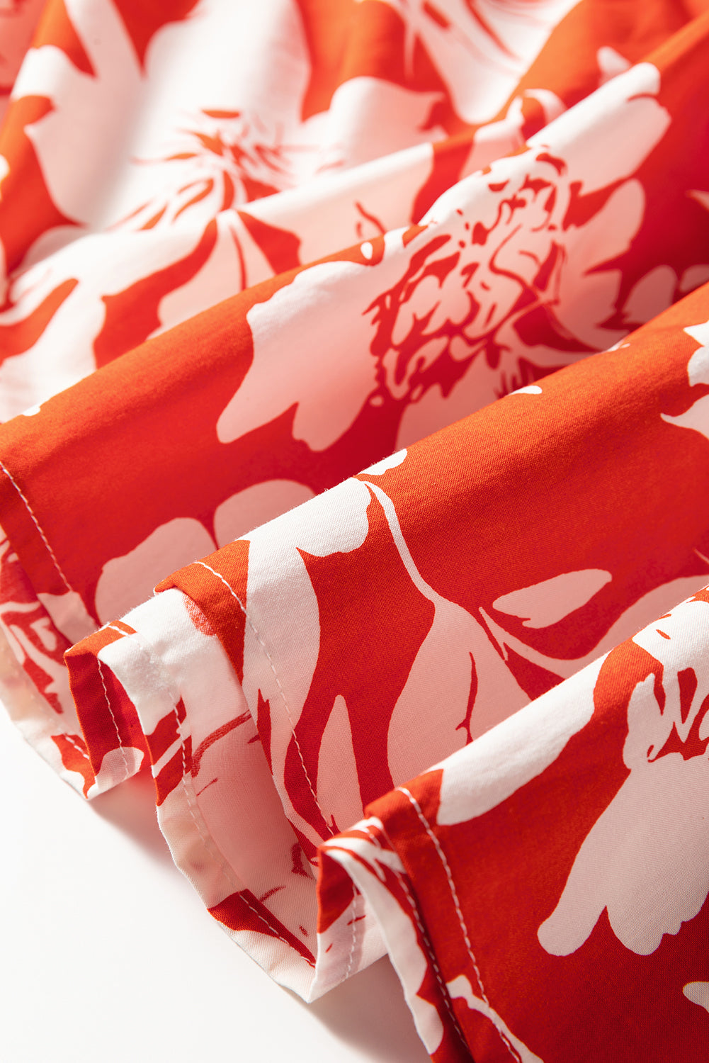 Byzantium Bay floral Western high split maxi skirt worn by a woman, flowing fabric with vibrant floral pattern.