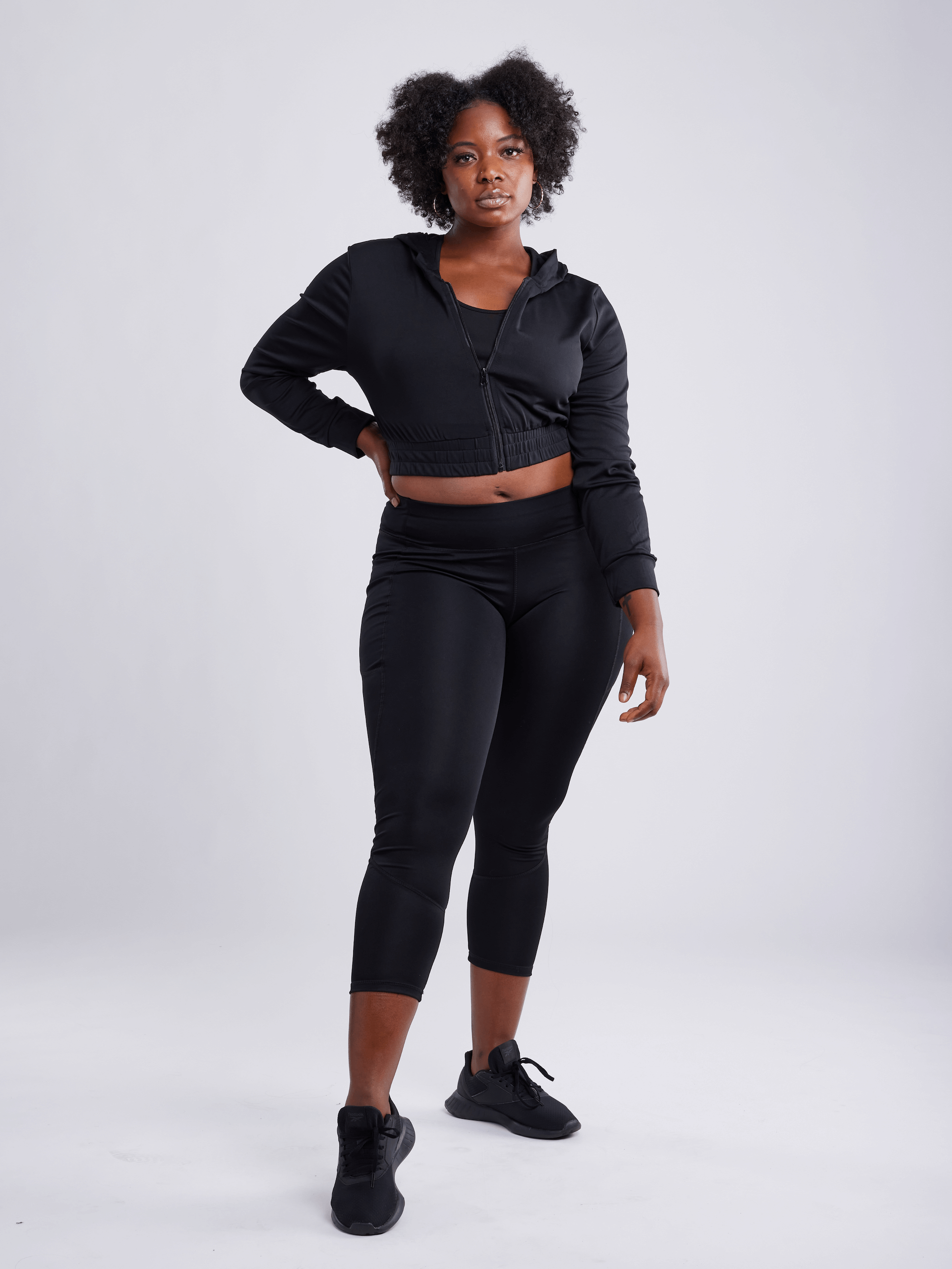 Black Lavender JupiterGear athletic zip-up crop hoodie jacket shown in black with sporty design and lightweight fabric.