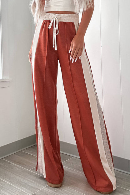 Carmine Juneberry Flamingo color block drawstring high waist wide-leg pants displayed on a model.
