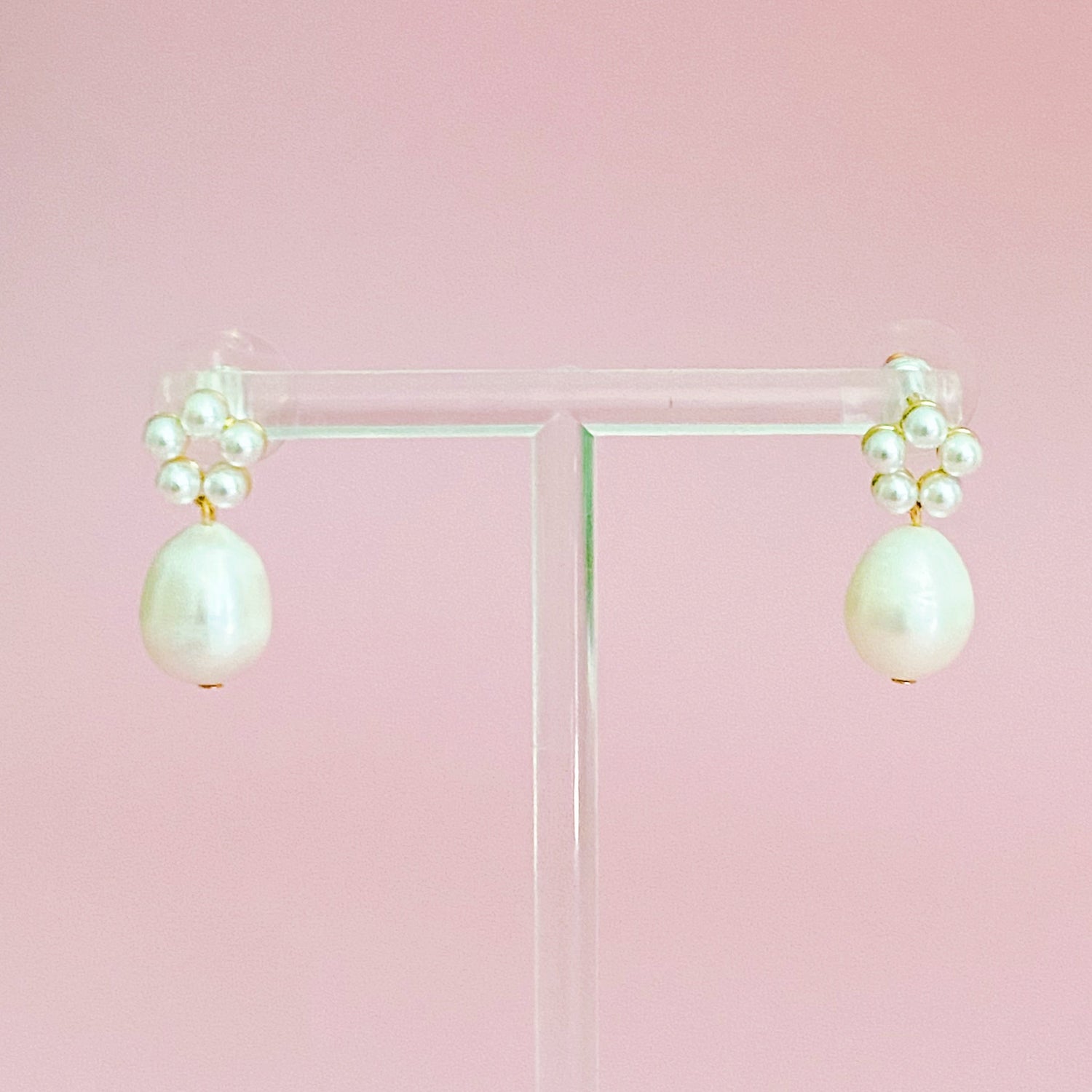 Fuchsia Hercules freshwater pearl drop earrings with elegant jewelry design featuring shimmering pearl pendants.