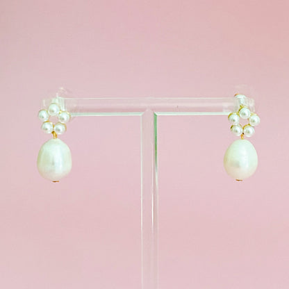 Fuchsia Hercules freshwater pearl drop earrings with elegant jewelry design featuring shimmering pearl pendants.