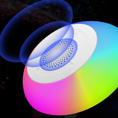 Salmon Lucky Floatilla Bluetooth waterproof LED pool speaker floating in water with colorful lights and control buttons visible.