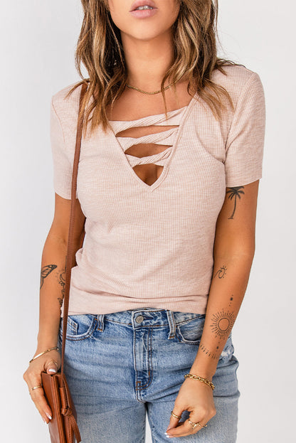 Black strappy hollow-out neck rib knit T-shirt by Harlequin Daisy, featuring a stylish cutout design and fitted ribbed fabric.