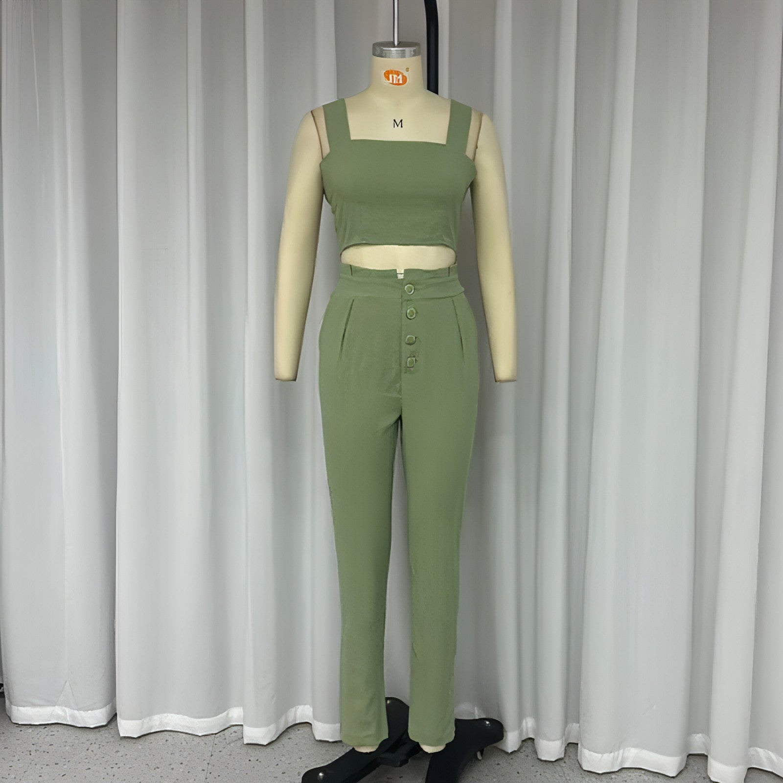 Carmine Juneberry matching set with short crop-top and high-waist trousers, spaghetti straps, two-piece outfit, stylish and trendy.