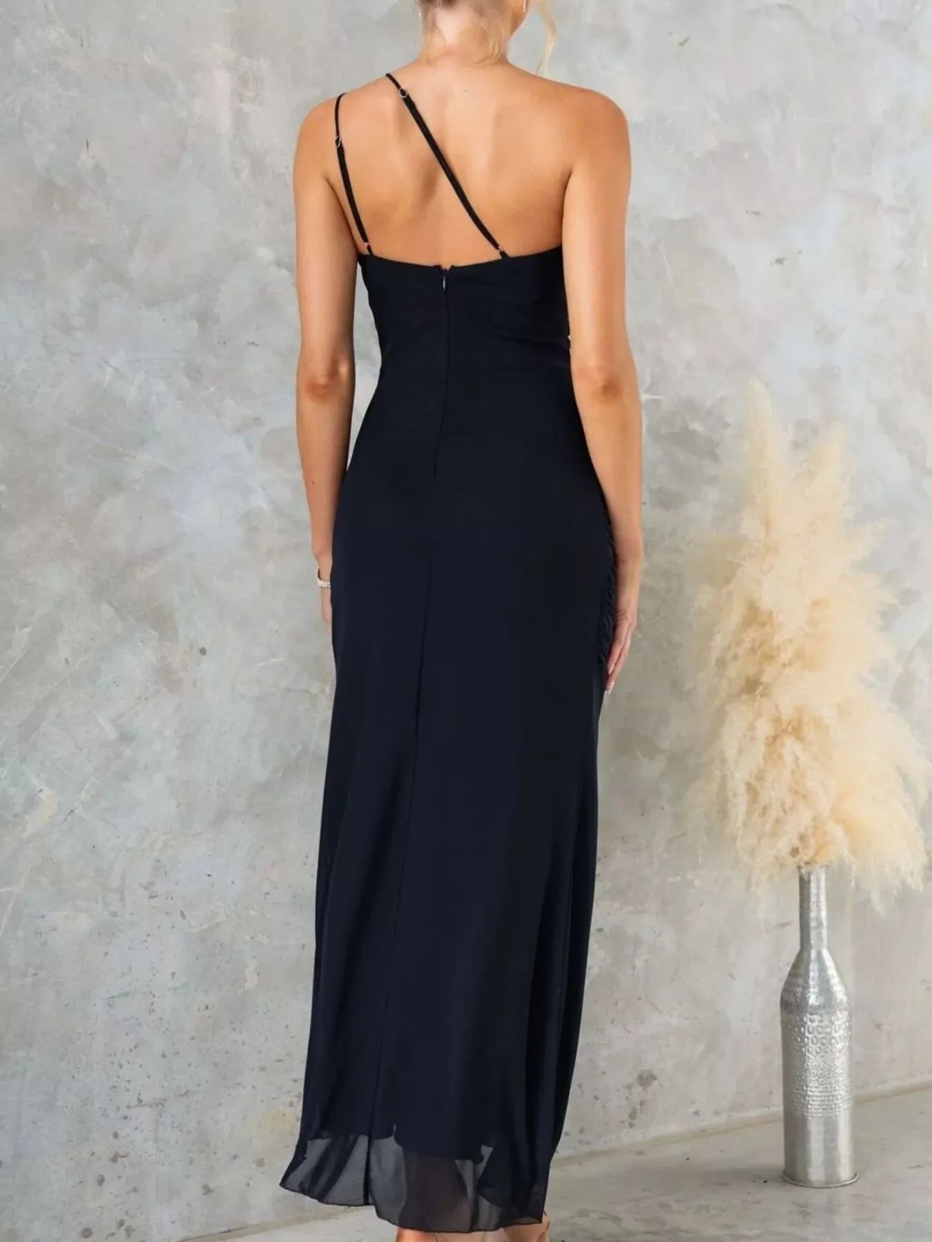 Elegant Jade Iapetus one-shoulder ruffle slit dress featuring flowing fabric and stylish design, perfect for special occasions.