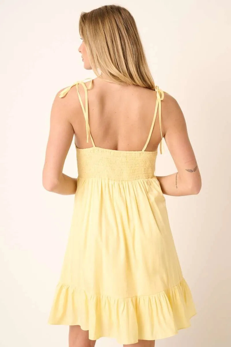Ruched detail spaghetti tie mini dress by Mittoshop, featuring a stylish design with a fitted silhouette and elegant detailing.