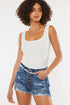 Jade Icarus Kancan distressed button fly denim shorts for women, showcasing frayed hem and casual fit.