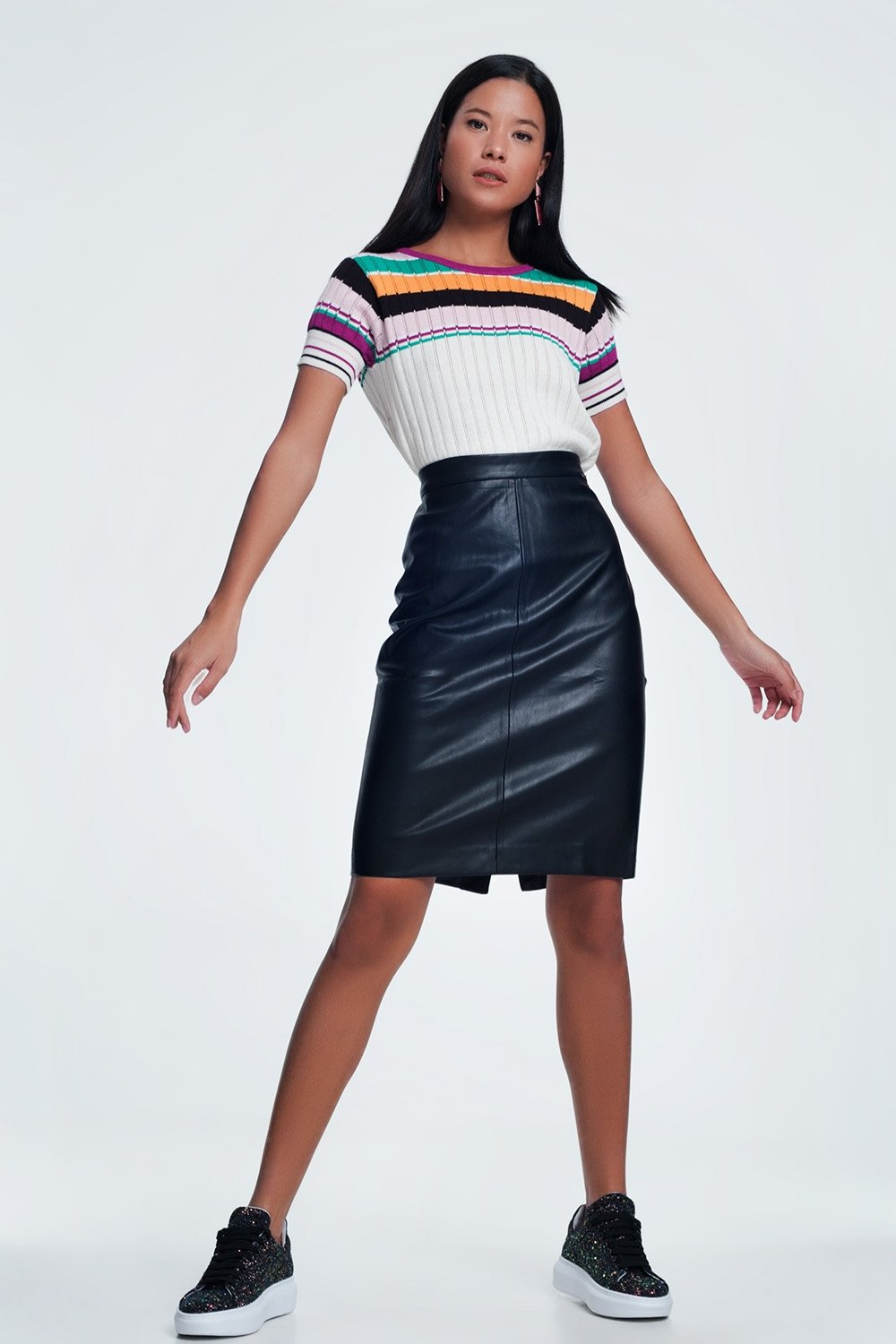 Black faux leather pencil skirt for women by Erin Theia, fitted style with sleek, smooth texture and high waist design.
