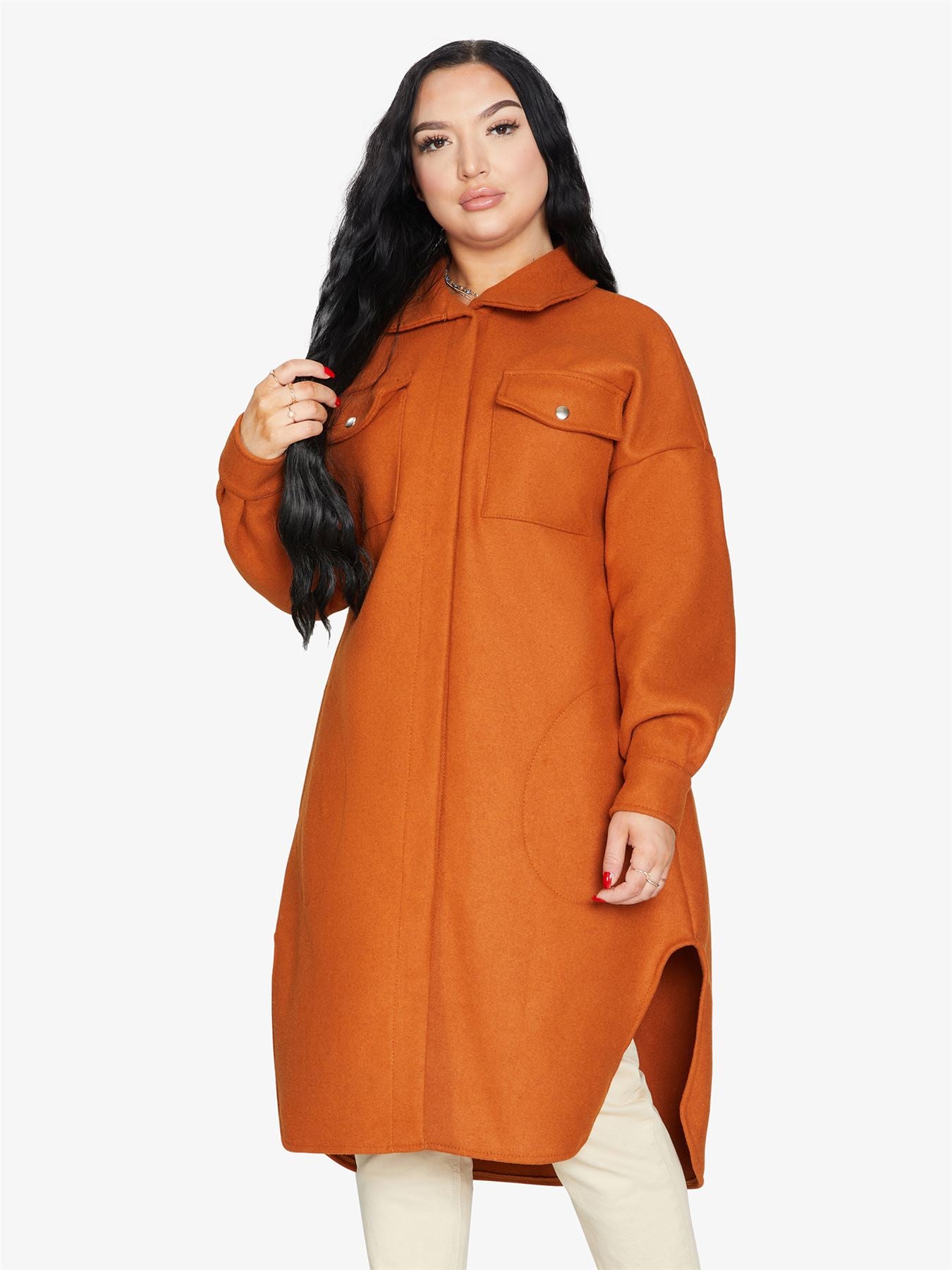 Rose Eleusis oversized longline shacket in neutral fabric, featuring a relaxed fit, button closure, and extended length for casual style.