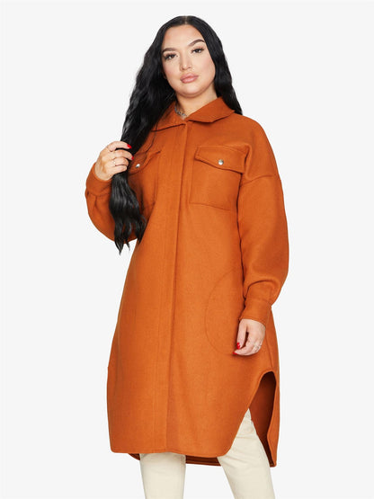 Rose Eleusis oversized longline shacket in neutral fabric, featuring a relaxed fit, button closure, and extended length for casual style.