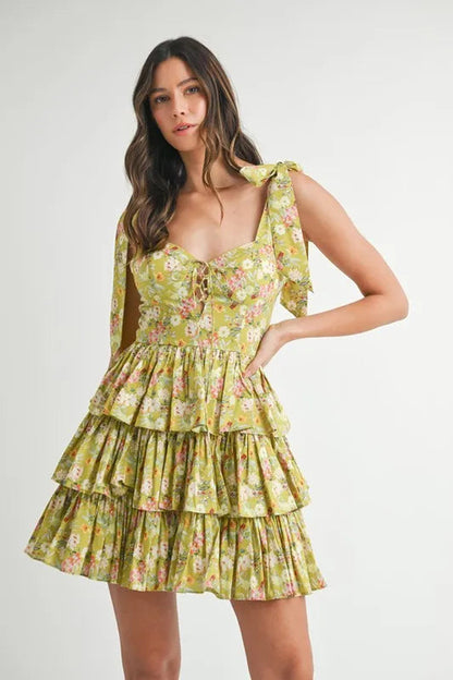 Pear Daisy MABLE floral print shoulder tie layered mini dress, featuring a vibrant floral pattern and stylish design.