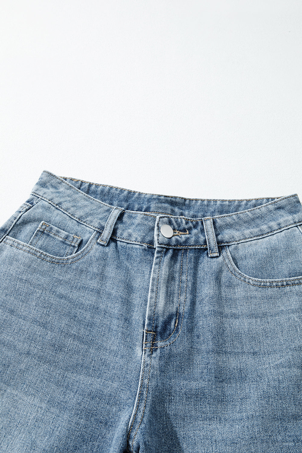 Byzantium Bay solid denim embroidered wide-leg jeans featuring intricate embroidery and a relaxed fit, casual streetwear style.