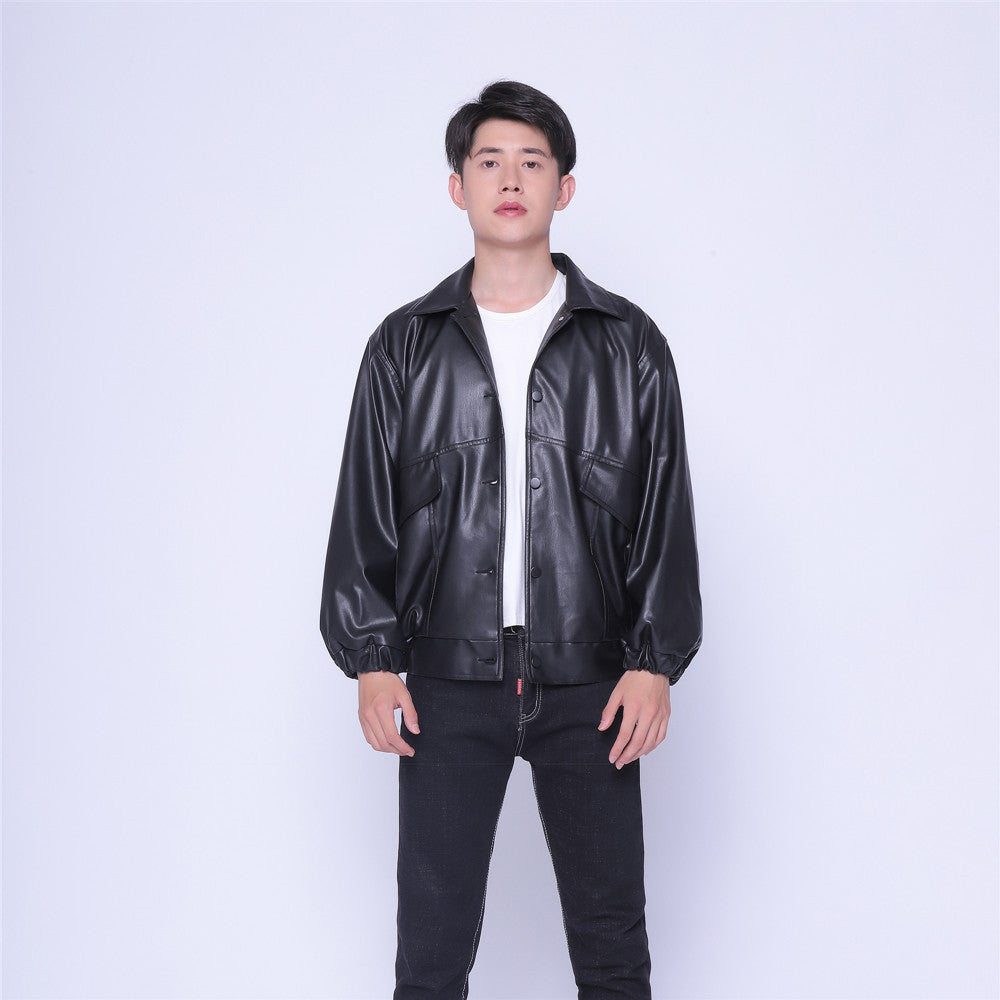 Black Drive Moto Jacket by Carmine Juneberry, Haute Edition 25, featuring a sleek leather design with zipper details and stylish collar.