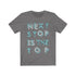 Plum Charlie Next Stop is The Top T-shirt featuring bold text design on a casual cotton tee.