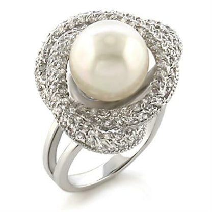 Rhodium brass ring with a white synthetic pearl, elegant jewelry piece by Turquoise Tiger featuring a polished band and pearl accent.