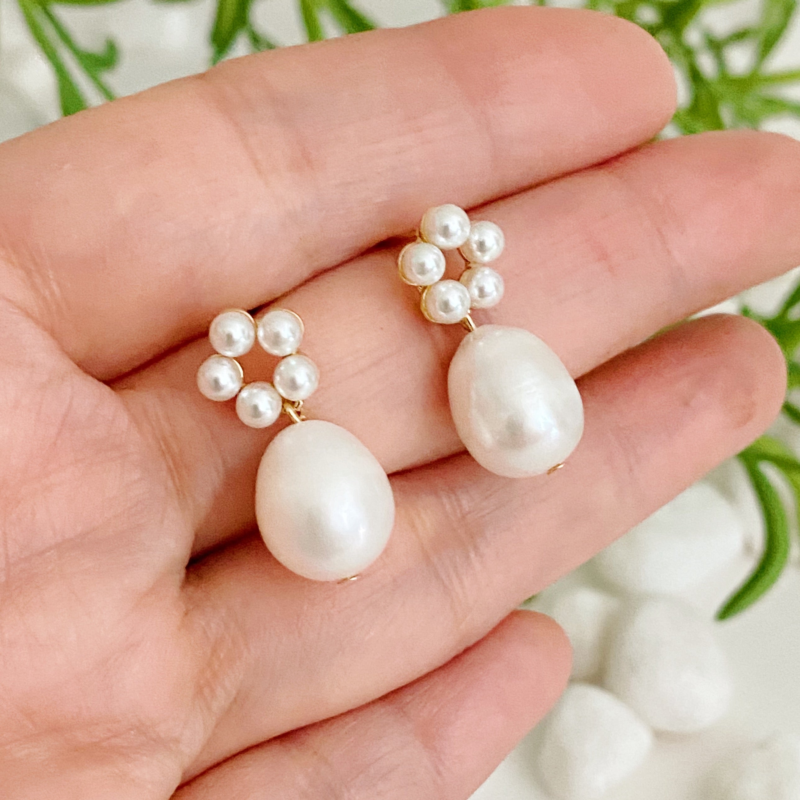 Fuchsia Hercules freshwater pearl drop earrings with elegant silver hooks, showcasing classic pearl jewelry design.