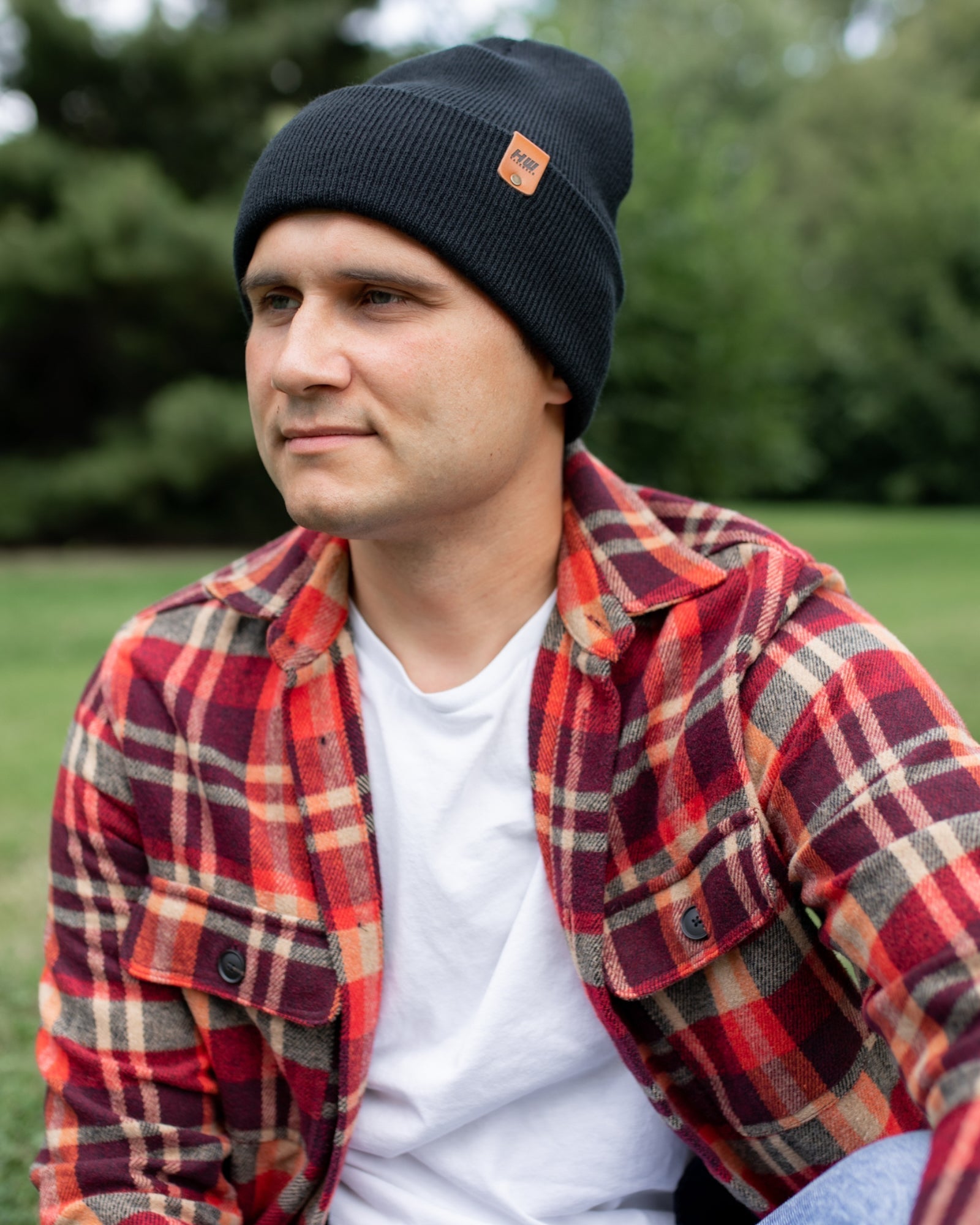 Azure Arrowwood HAAKWEAR Knit Cuffed Beanie in Dune Beige, cozy knit hat with cuffed style and neutral beige color.