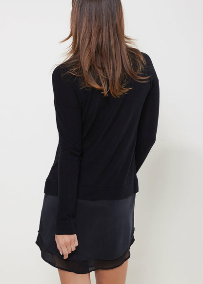 Black women’s twofer pullover sweater dress by Lemon Hera, featuring a cozy knit fabric and relaxed fit.