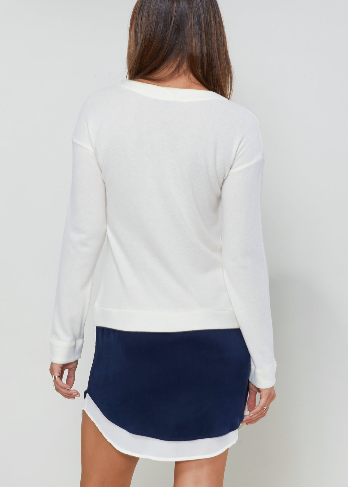 Women’s white Twofer Pullover Sweater Dress by Lemon Hera, featuring a cozy knit design and comfortable fit.