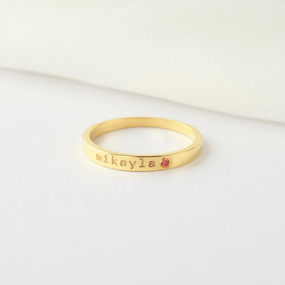 Personalized green millie name ring with birthstone, stackable mom ring featuring engraved name and gemstone accent.