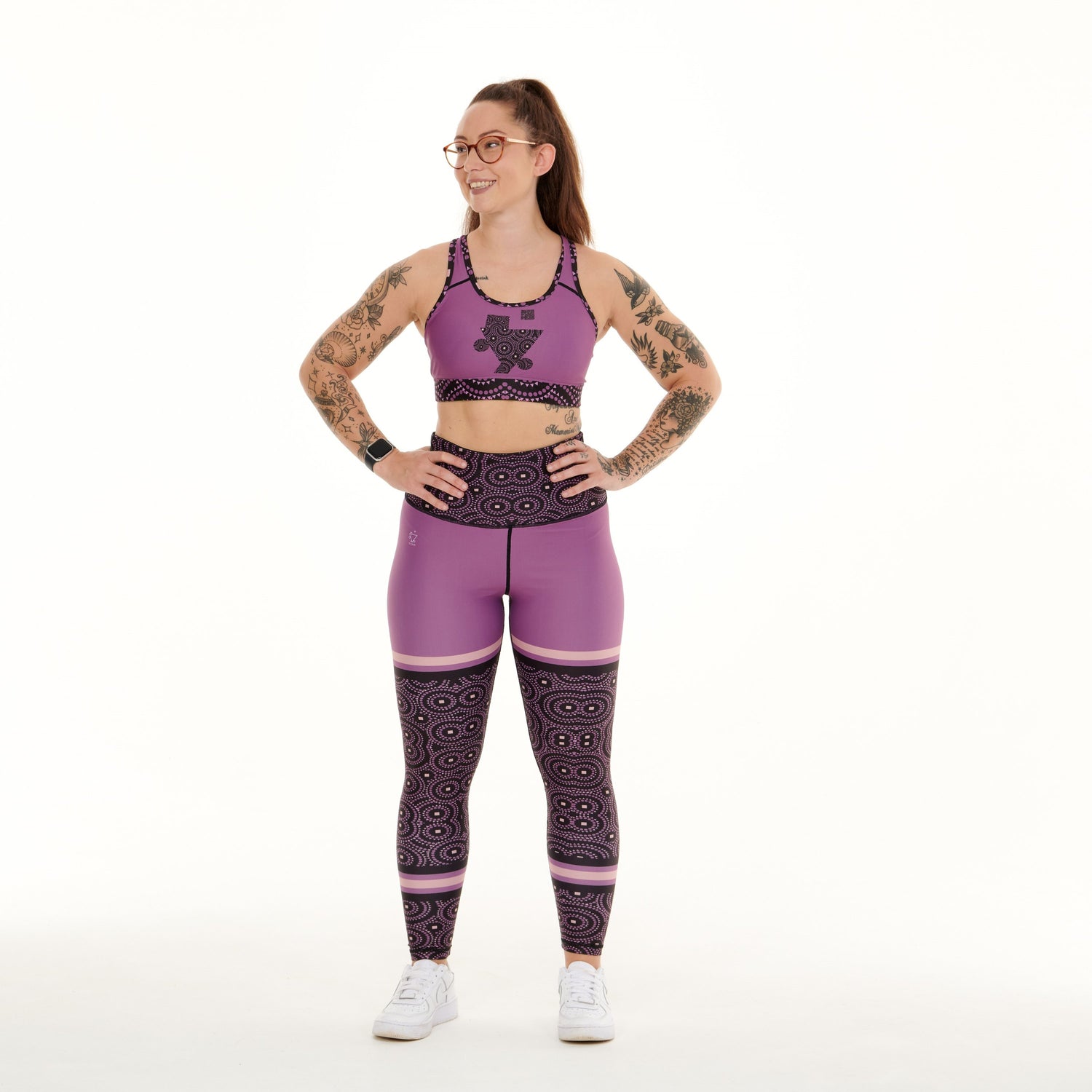 White Oliver Signature on purple funky activewear leggings with bold patterns and a comfortable fit for workout or casual wear.