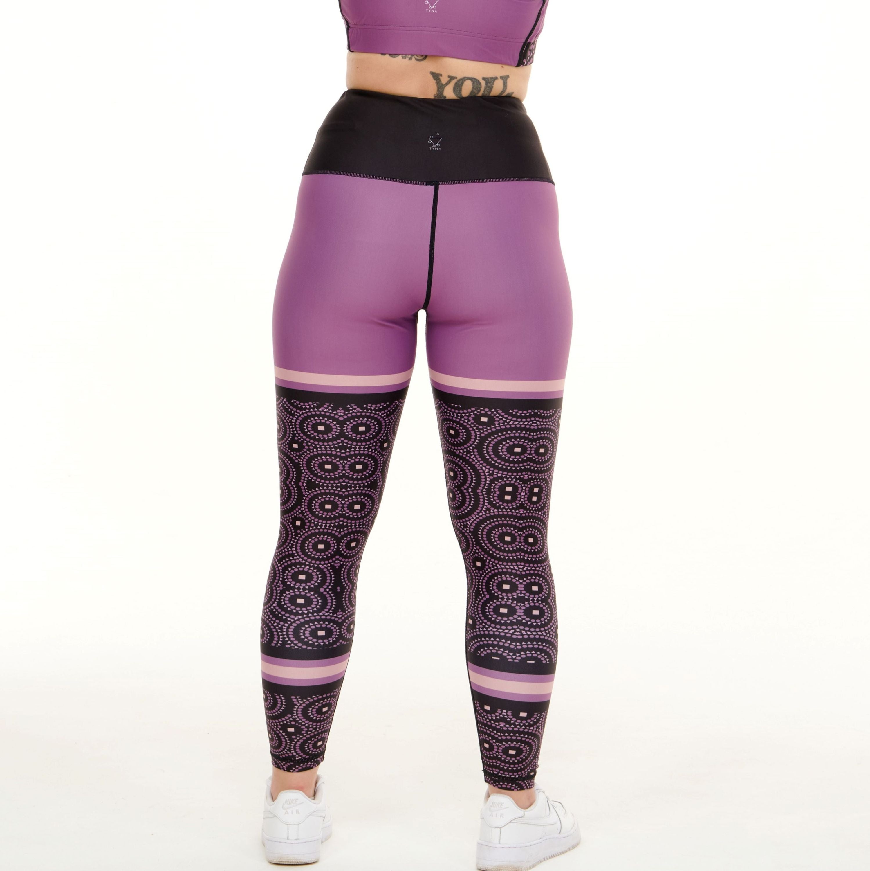 White Oliver Signature Purple Funky Leggings, vibrant activewear with bold patterns and a comfortable fit, shown on a model.