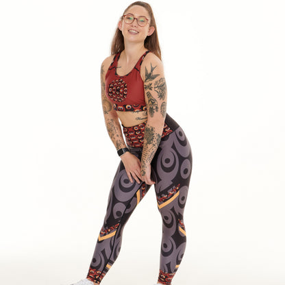 White Oliver Siefay On Iron Red Splash activewear leggings with bold red splash design on black fabric, suitable for workout and athletic wear.