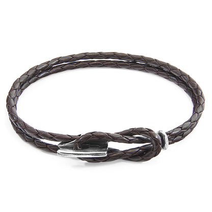 Dark brown leather and silver bracelet from Magenta Sooty featuring a sleek, stylish design with adjustable closure.
