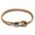 Light brown leather and silver bracelet from Magenta Sooty, featuring a stylish Padstow design and adjustable closure.
