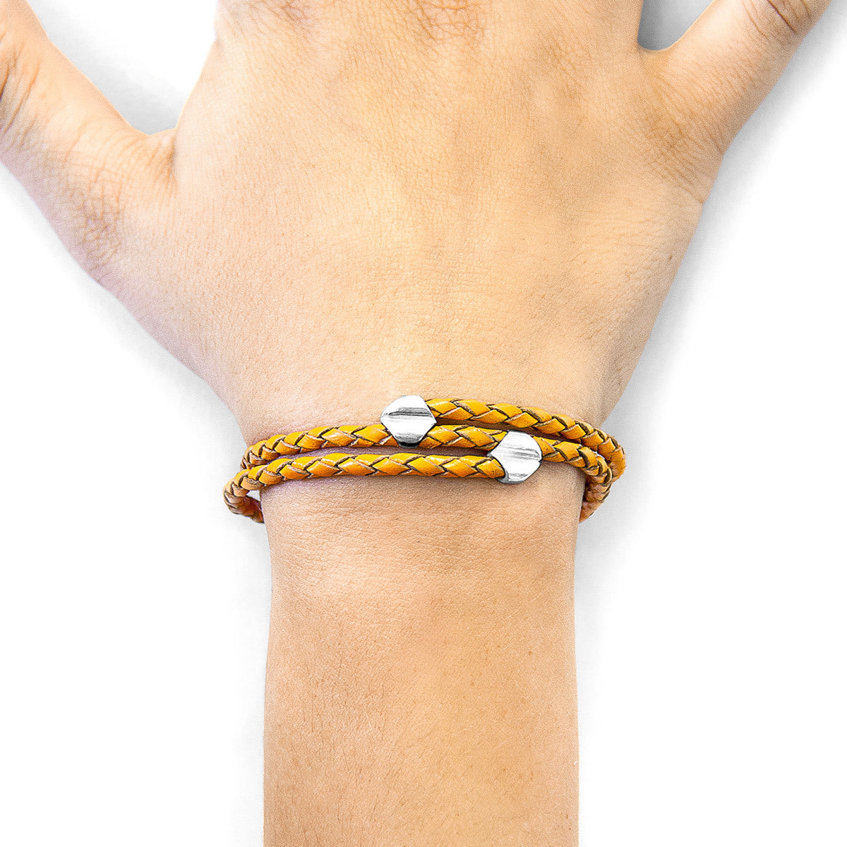 Fire orange Conway silver and leather bracelet by Magenta Sooty featuring vibrant orange leather and sleek silver accents.