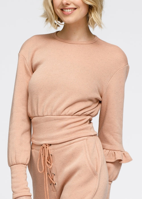Lemon Hera peach crewneck sweatshirt with ruffle sleeve and peplum design, casual sweater for stylish comfort.
