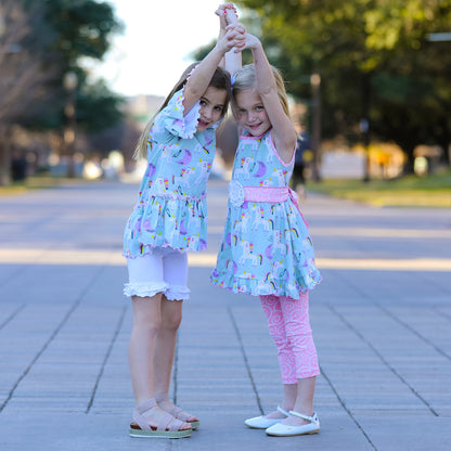 Black Simba girl’s unicorn rainbow dress with pink swirl leggings, colorful kids’ clothing outfit featuring whimsical unicorn and rainbow design.