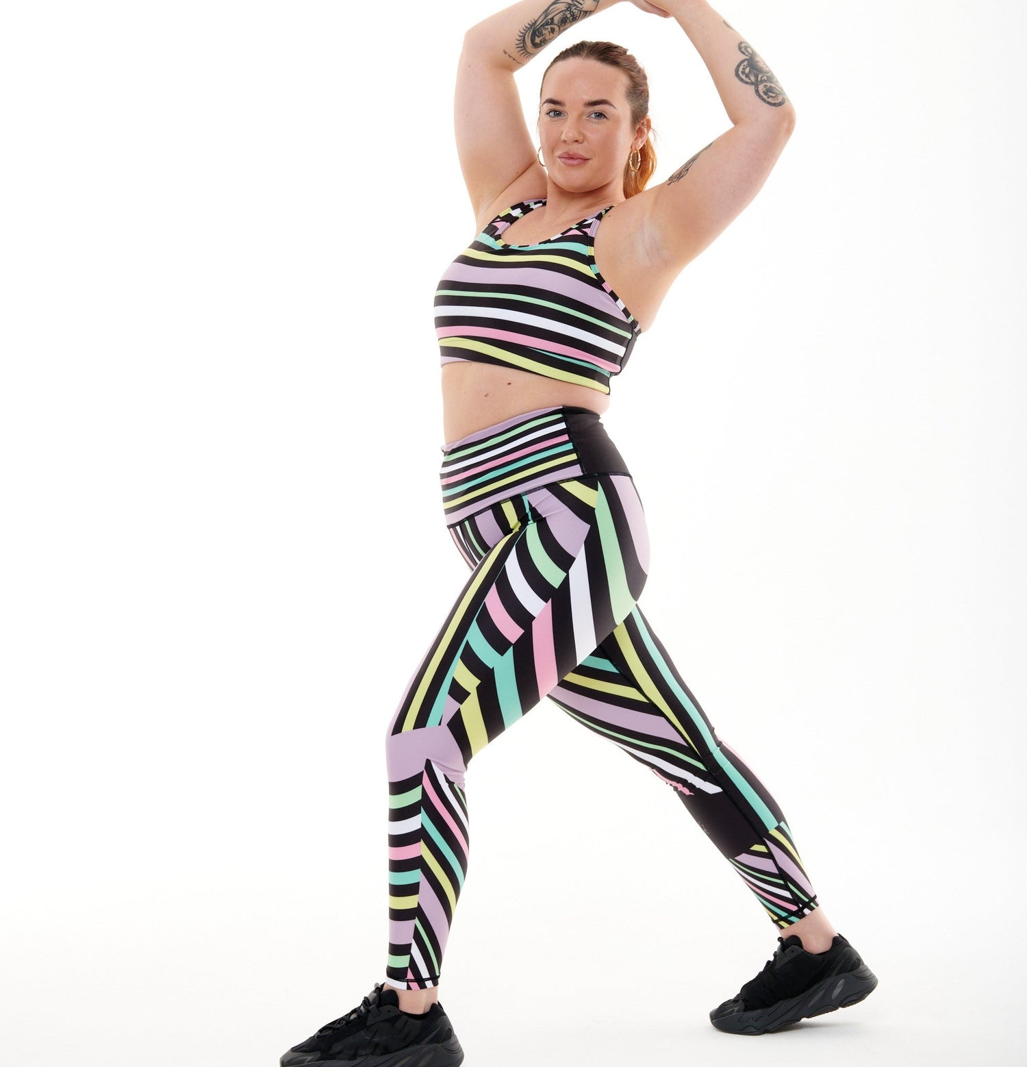 White Oliver Aso-Oke pastel vibrant leggings for activewear, featuring colorful traditional-inspired patterns and a comfortable fit.