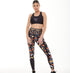 White Oliver Batiq Vibrant Activewear Leggings with colorful geometric patterns, close-up view of the stretchy fabric.