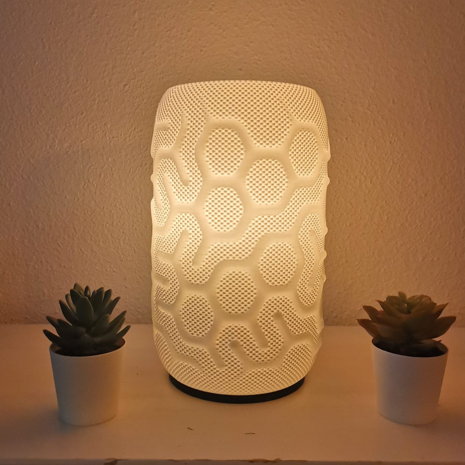 Azure Pontus Aether Glow lighting fixture with sleek modern design, shown in a well-lit setting highlighting its stylish appearance.