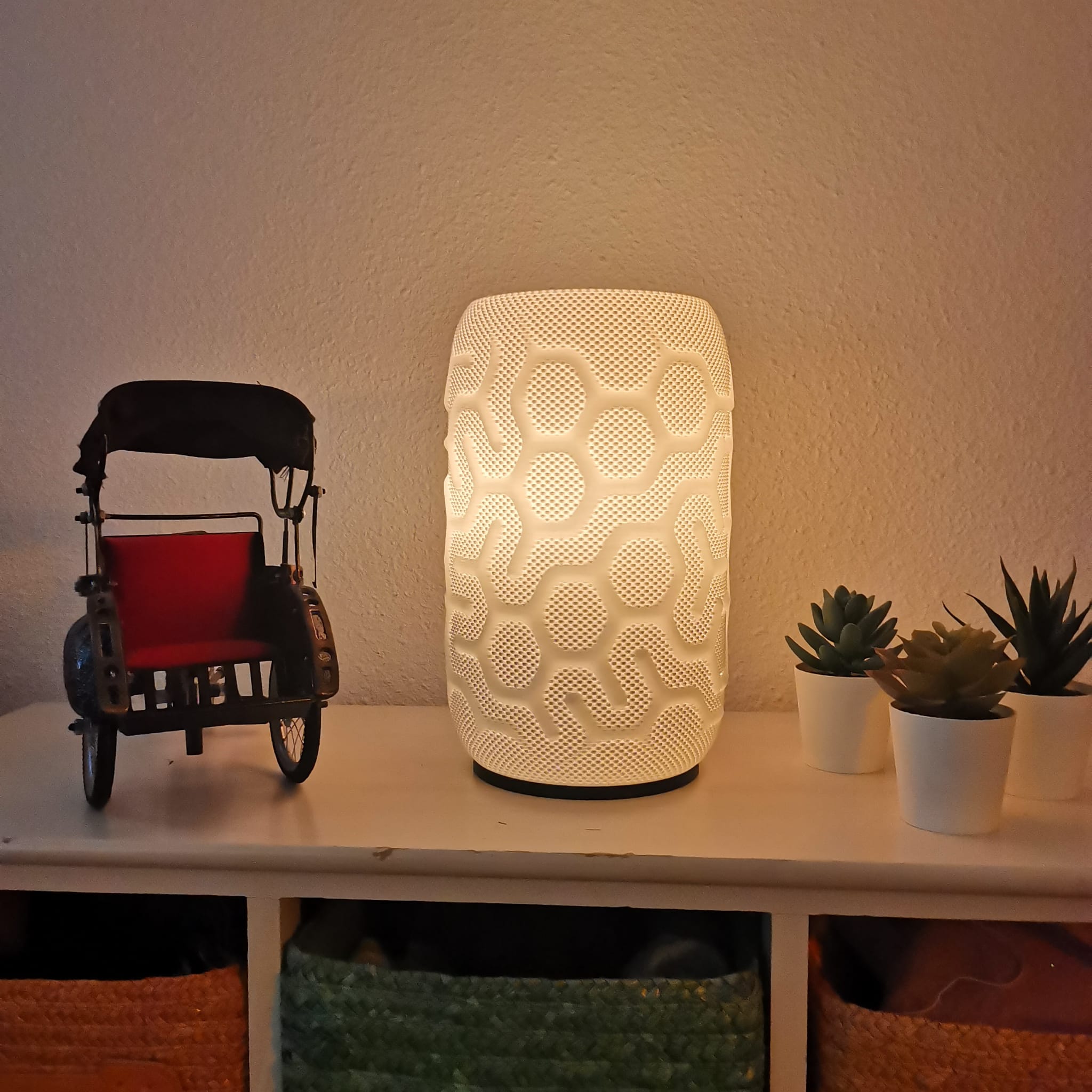 Azure Pontus Aether Glow lighting fixture with sleek design and warm illumination, shown in a modern interior setting.