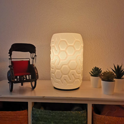 Azure Pontus Aether Glow lighting fixture with sleek design and warm illumination, shown in a modern interior setting.