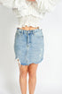 Light blue Amalia ripped denim mini skort by Azure Thanatos, featuring distressed details and a stylish, casual fit for women&