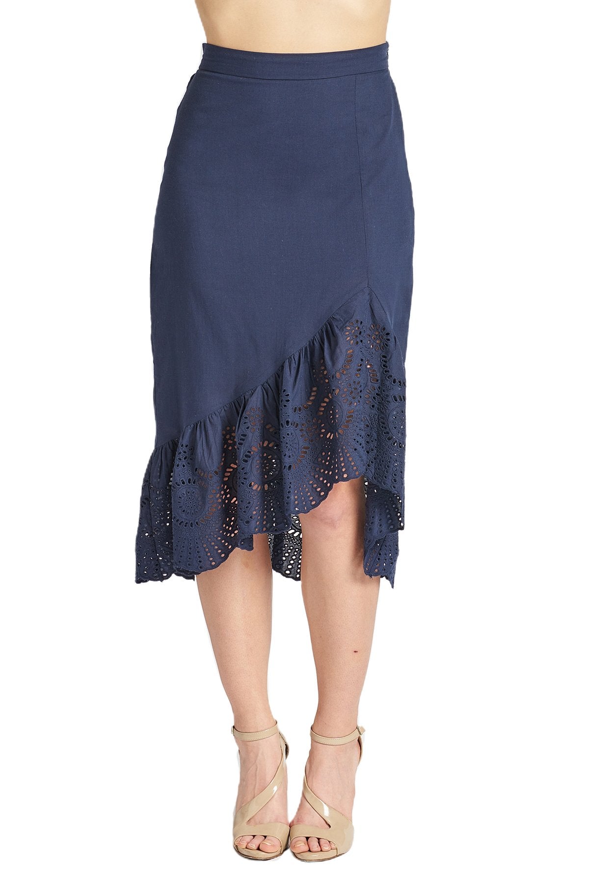 Navy cotton eyelet Aster Skirt by Peach Dionysus featuring an asymmetric hi-lo hem and floral eyelet details.
