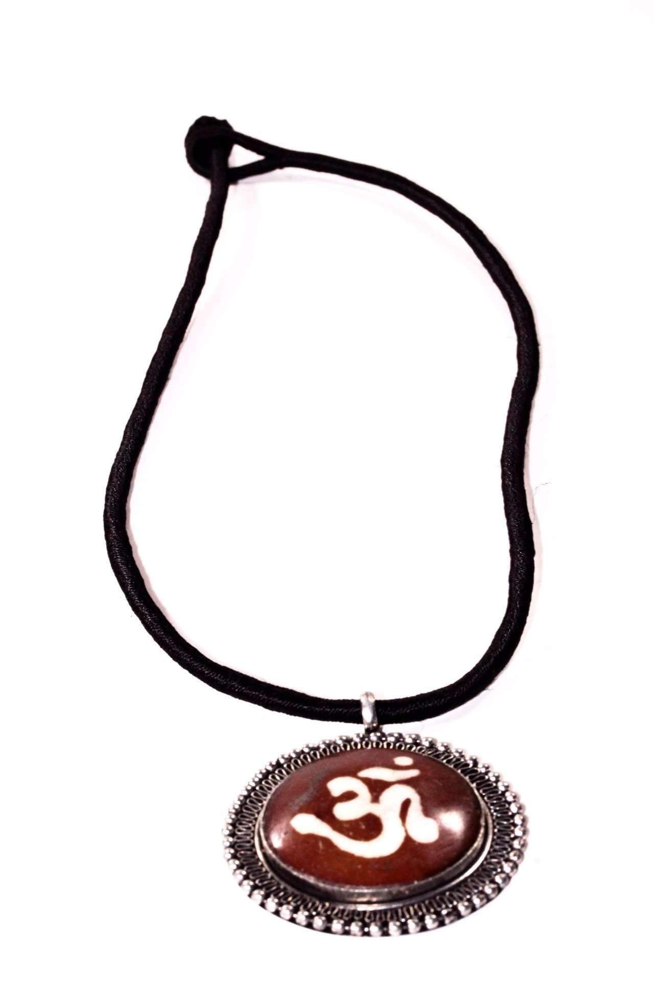 Silver Hestia auspicious Om spiritual necklace with intricate pendant design, perfect for spiritual or everyday wear.